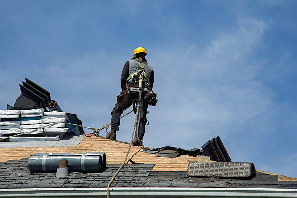 Professional Gutter Installation technician working in Bayville, NY